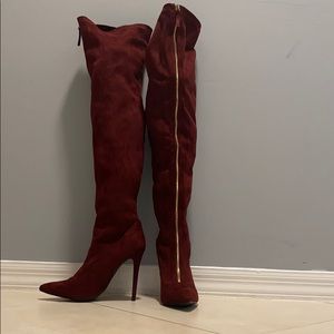 Over the knee zip up boots